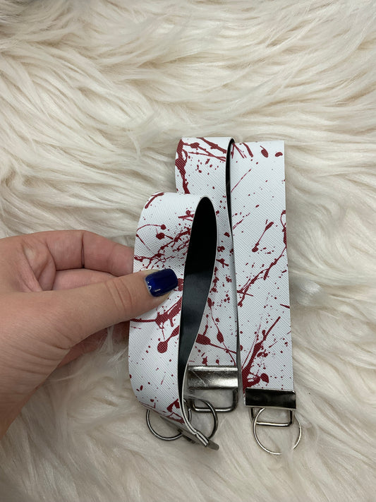 white blood splatter keychain wristlet