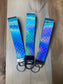 Blue holographic keychain wristlet